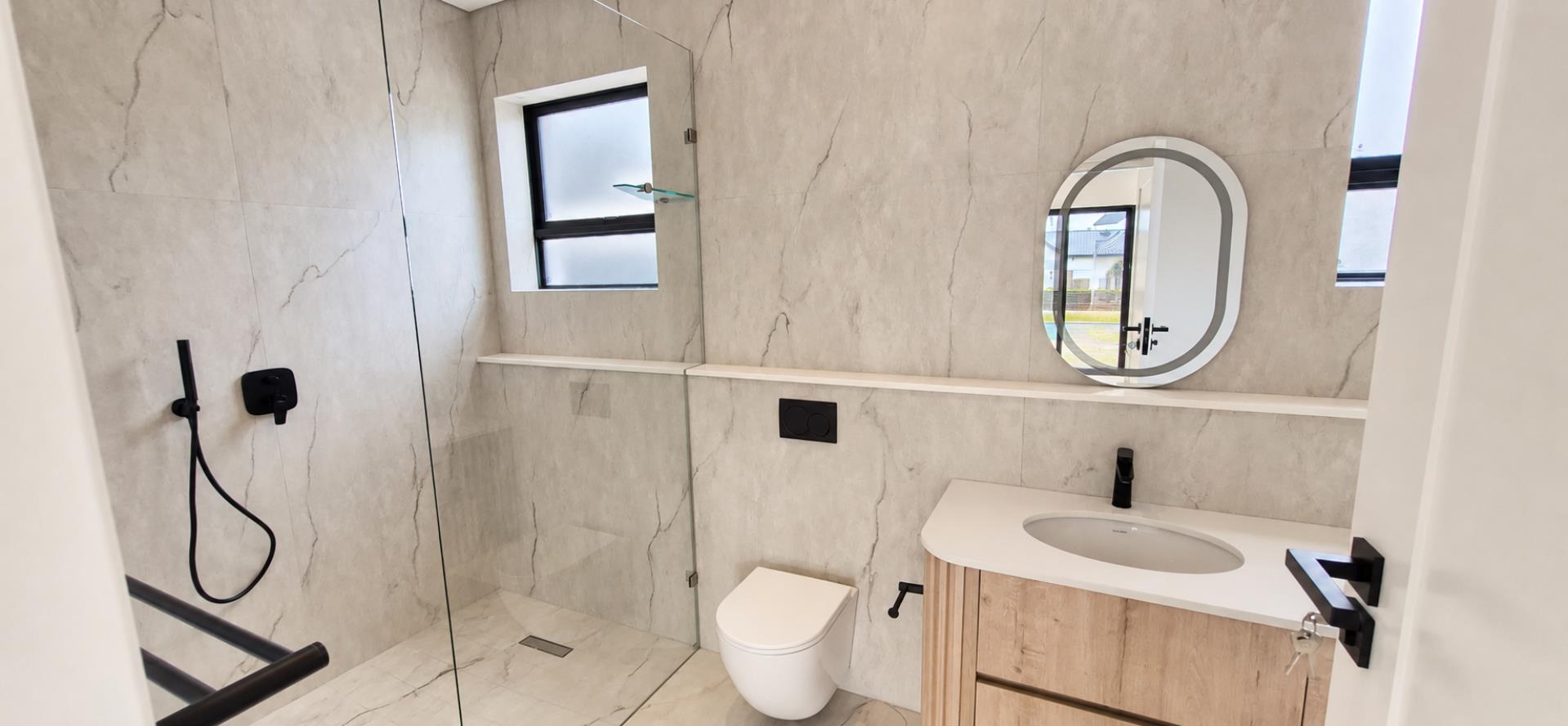 769733_Modern_Marble_Bathroom_with_Glass_Shower.png