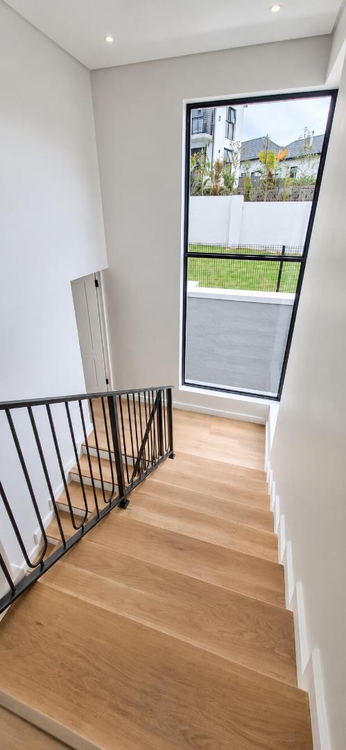 769733_Modern_Stairwell_with_Garden_Views.png