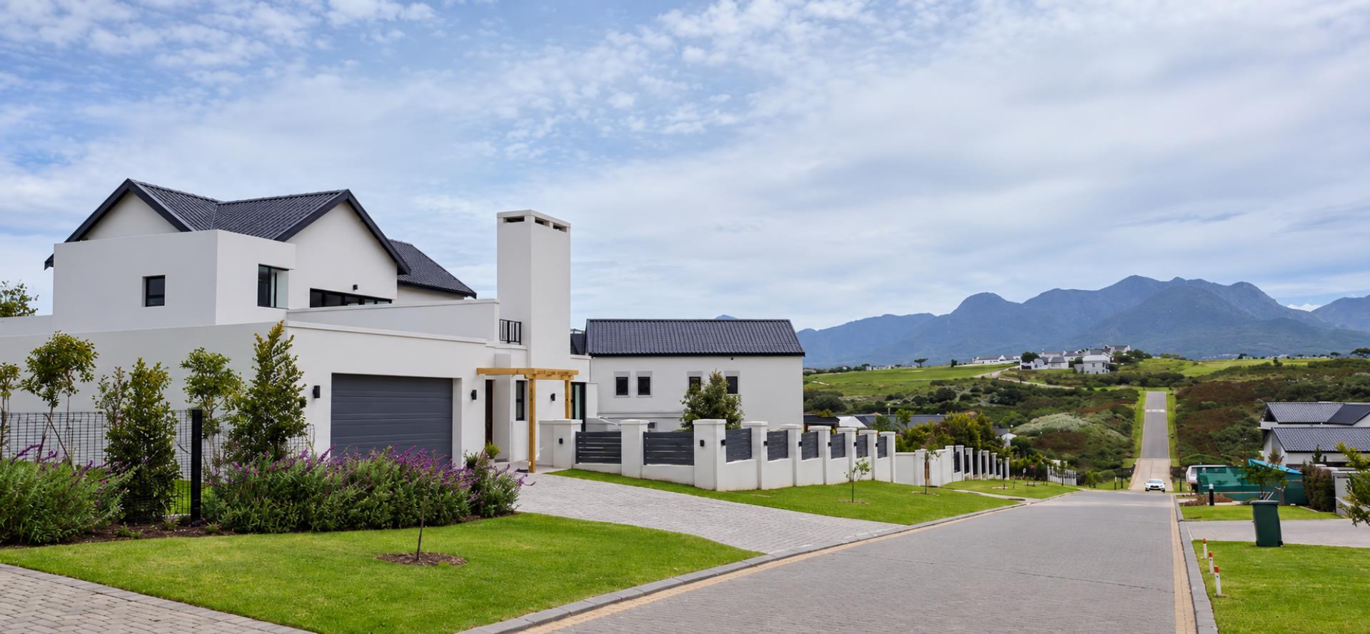 769733_Modern_White_Home_Overlooking_Mountain_Valley.png